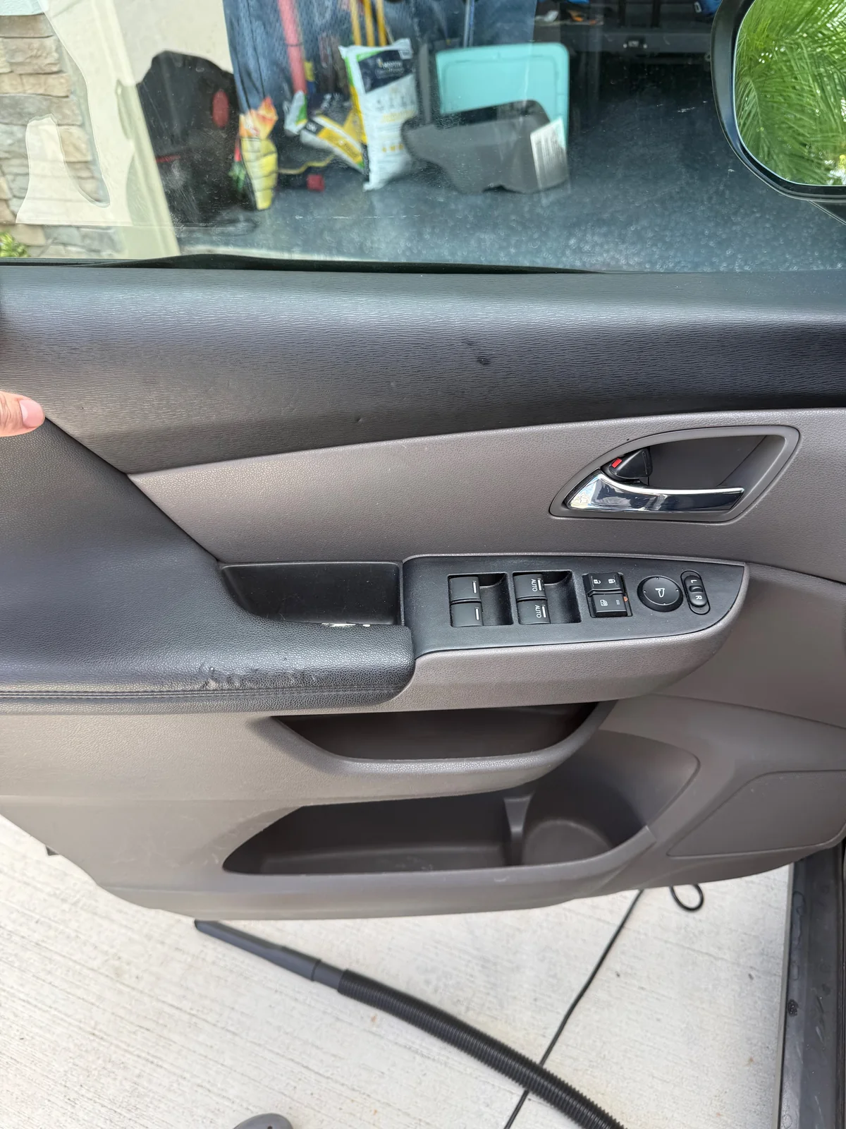 Honda Odyssey driver door after detailing, clean and evenly finished