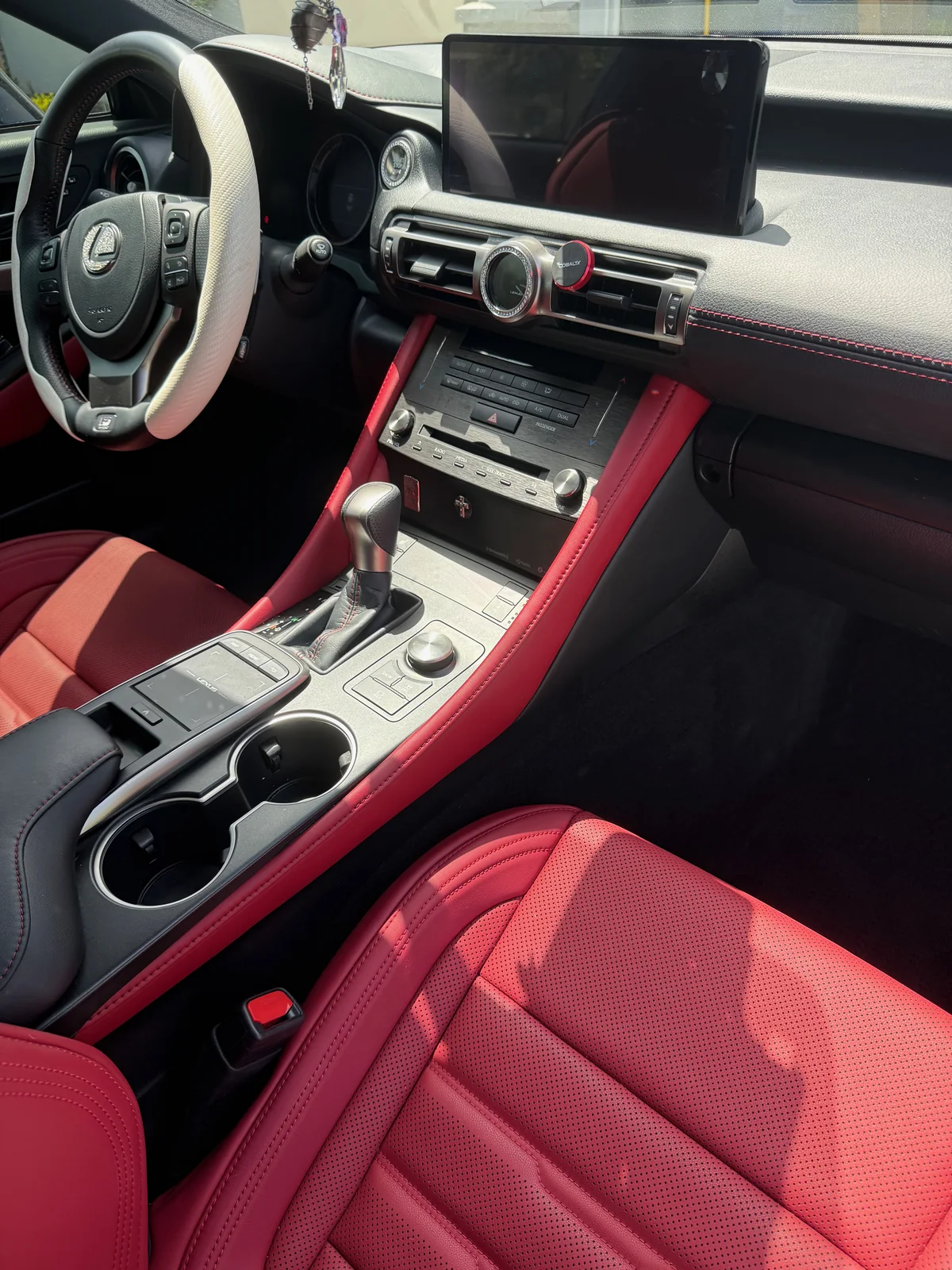 Lexus RC 350 center console after detailing, cleared and polished